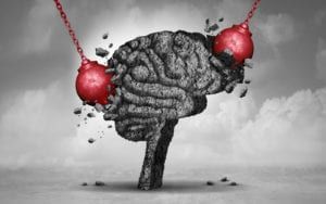 Two wrecking balls impacting a stylized brain